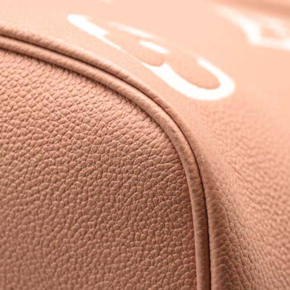 LOUIS VUITTON Empreinte Monogram Giant Neverfull MM Trianon Pink Cream