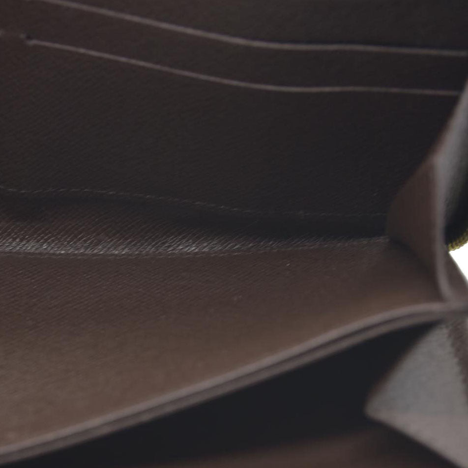 $865 Louis Vuitton  Damier Ebene Zippy Wallet CA3163