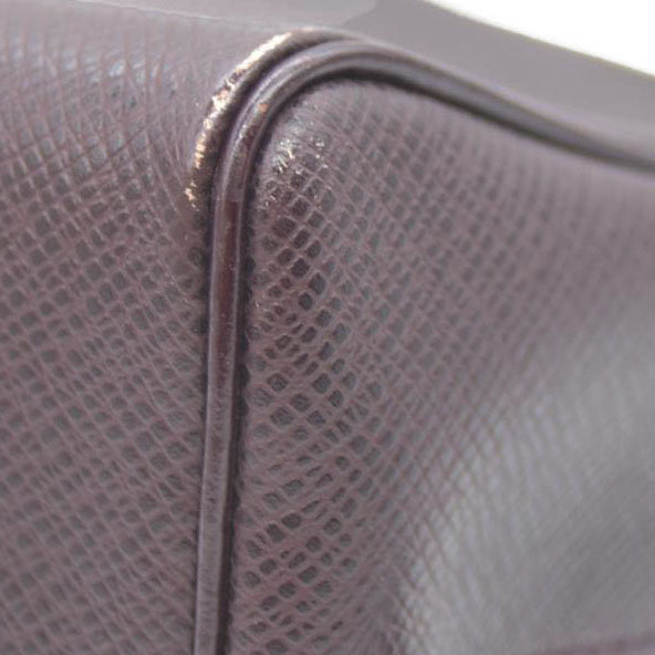 Louis Vuitton  Taiga Trousse Toilette PM Acajou