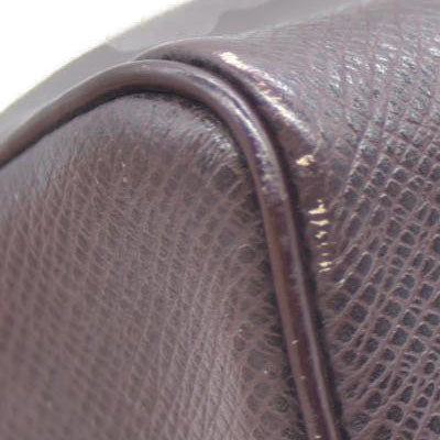 Louis Vuitton  Taiga Trousse Toilette PM Acajou