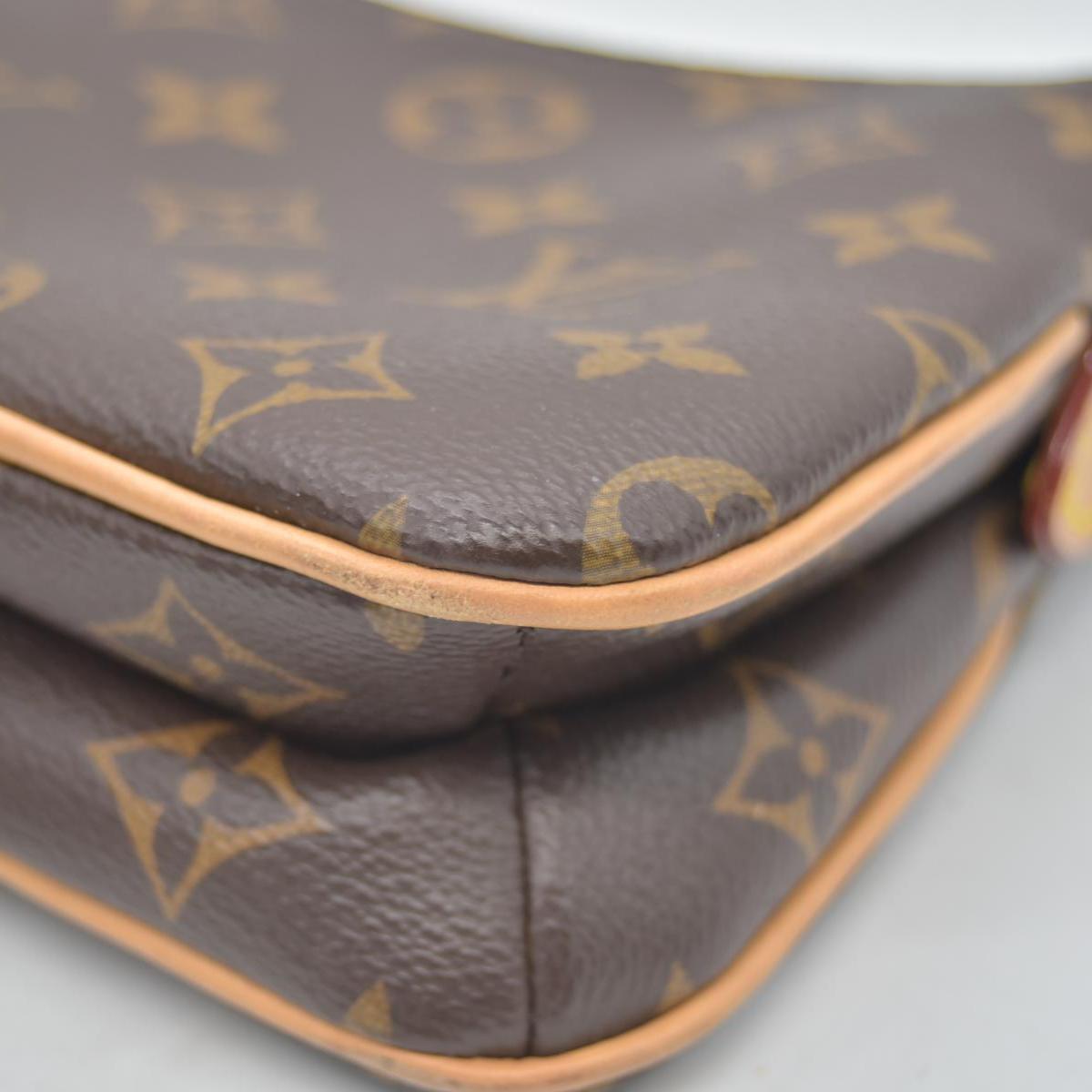$1,950 LOUIS VUITTON Monogram Liv Pochette