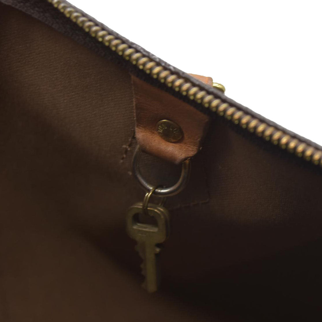 $1550 Louis Vuiton Monogram Speedy 30 SD1193