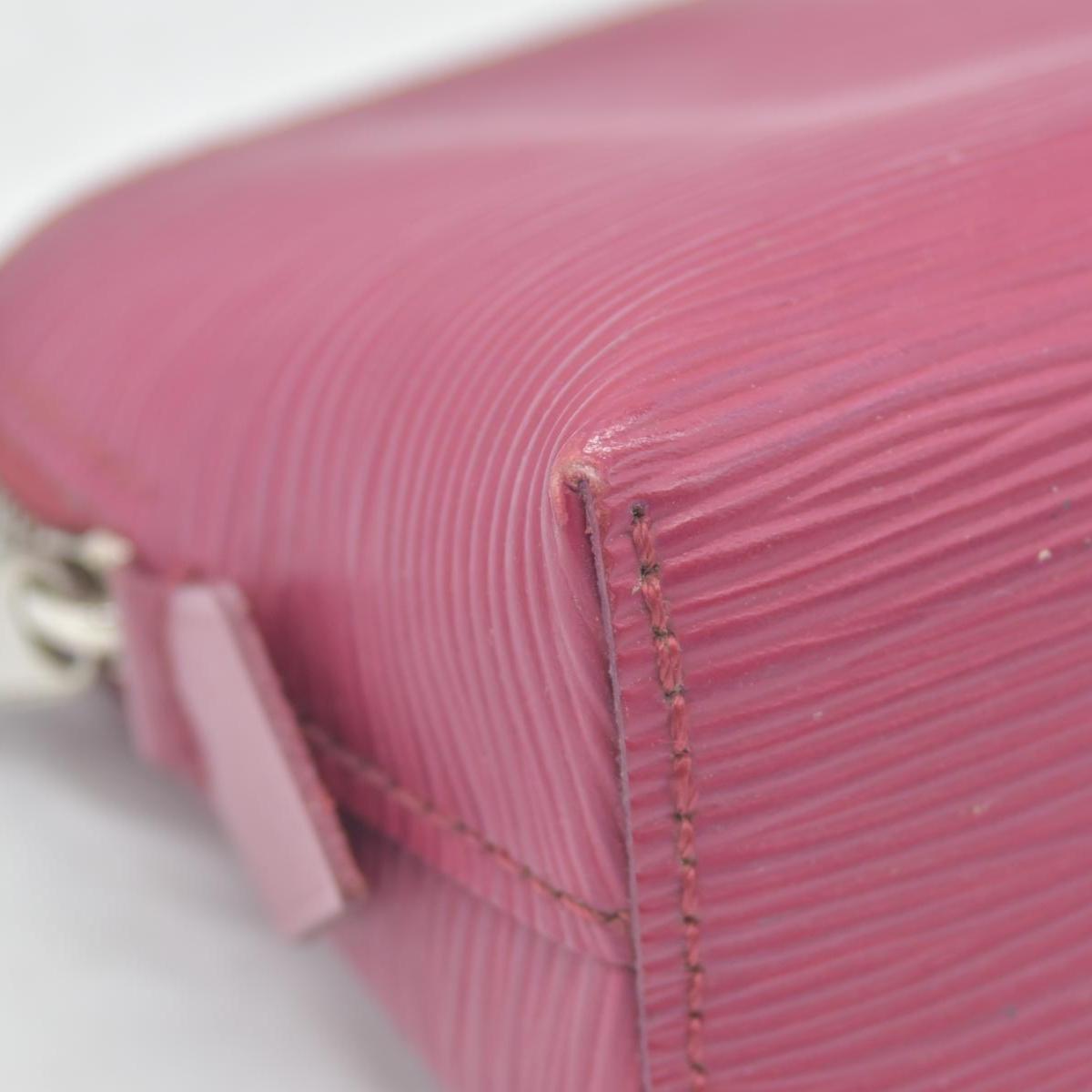 $825 Louis Vuitton Epi Pochette Cosmetic pouch in fuchsia CONSIGNMENT