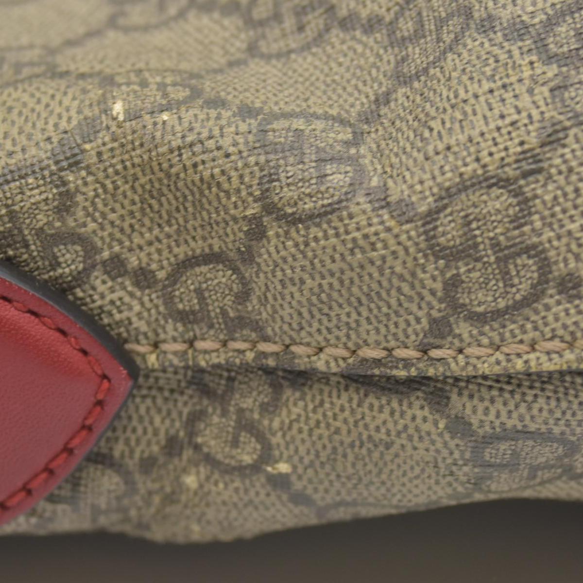 $1980 Gucci GG Supreme Monogram Linea A Hobo Red