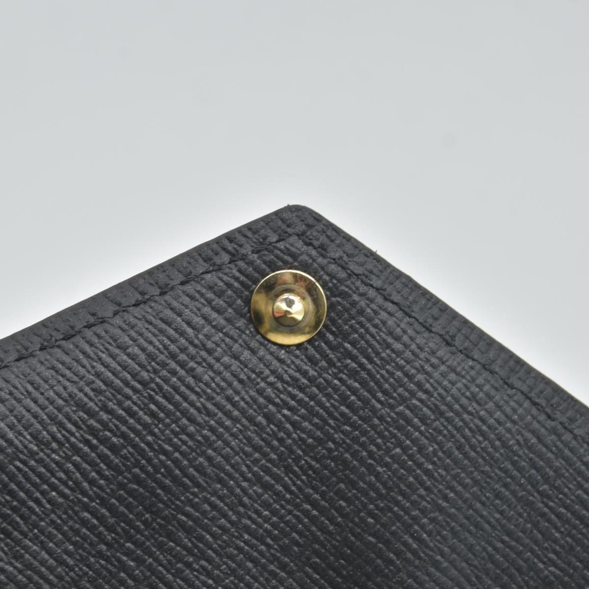 $675 Louis Vuitton Monogram Recto Verso Card Holder Black