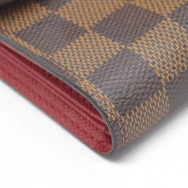 $750 LOUIS VUITTON Damier Ebene Koala Compact Wallet