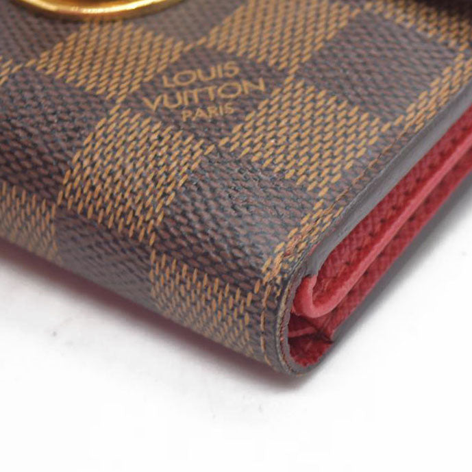 $750 LOUIS VUITTON Damier Ebene Koala Compact Wallet