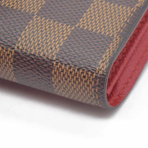 $750 LOUIS VUITTON Damier Ebene Koala Compact Wallet