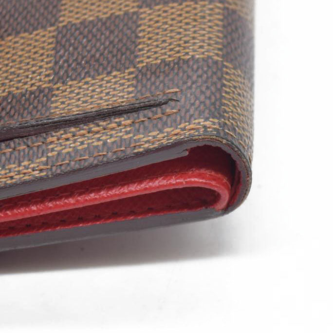 $750 LOUIS VUITTON Damier Ebene Koala Compact Wallet