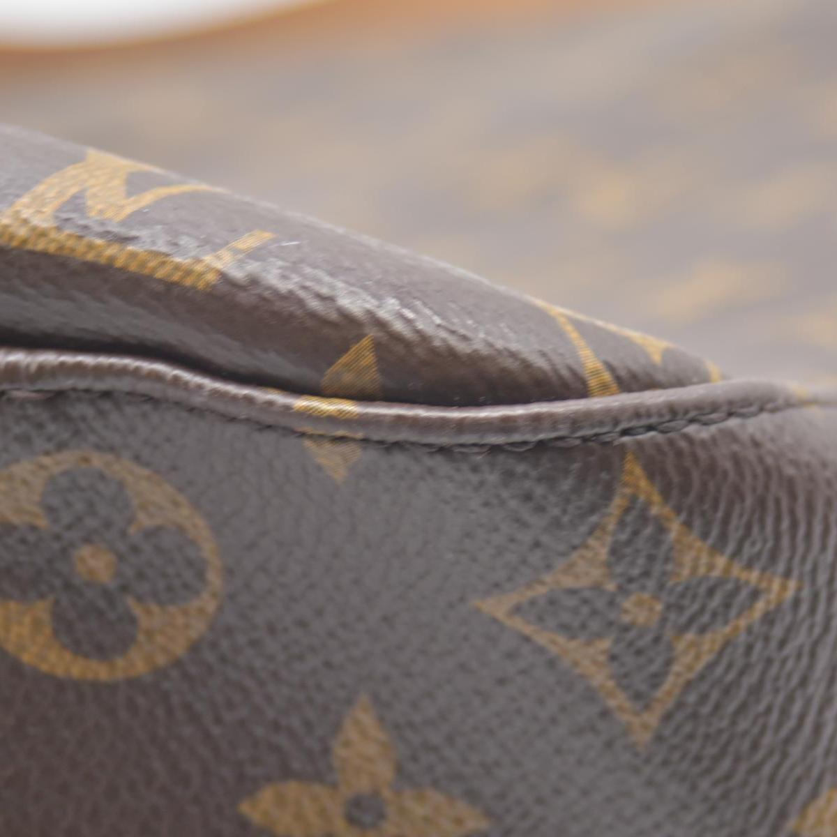 $2740 Louis Vuitton Monogram Slouchy MM