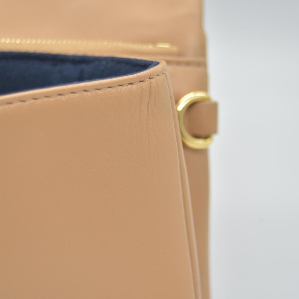 $3150 Louis Vuitton Lambskin Embossed Monogram Pochette Coussin Camel Color Transfer