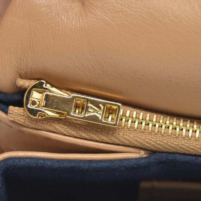 $3150 Louis Vuitton Lambskin Embossed Monogram Pochette Coussin Camel