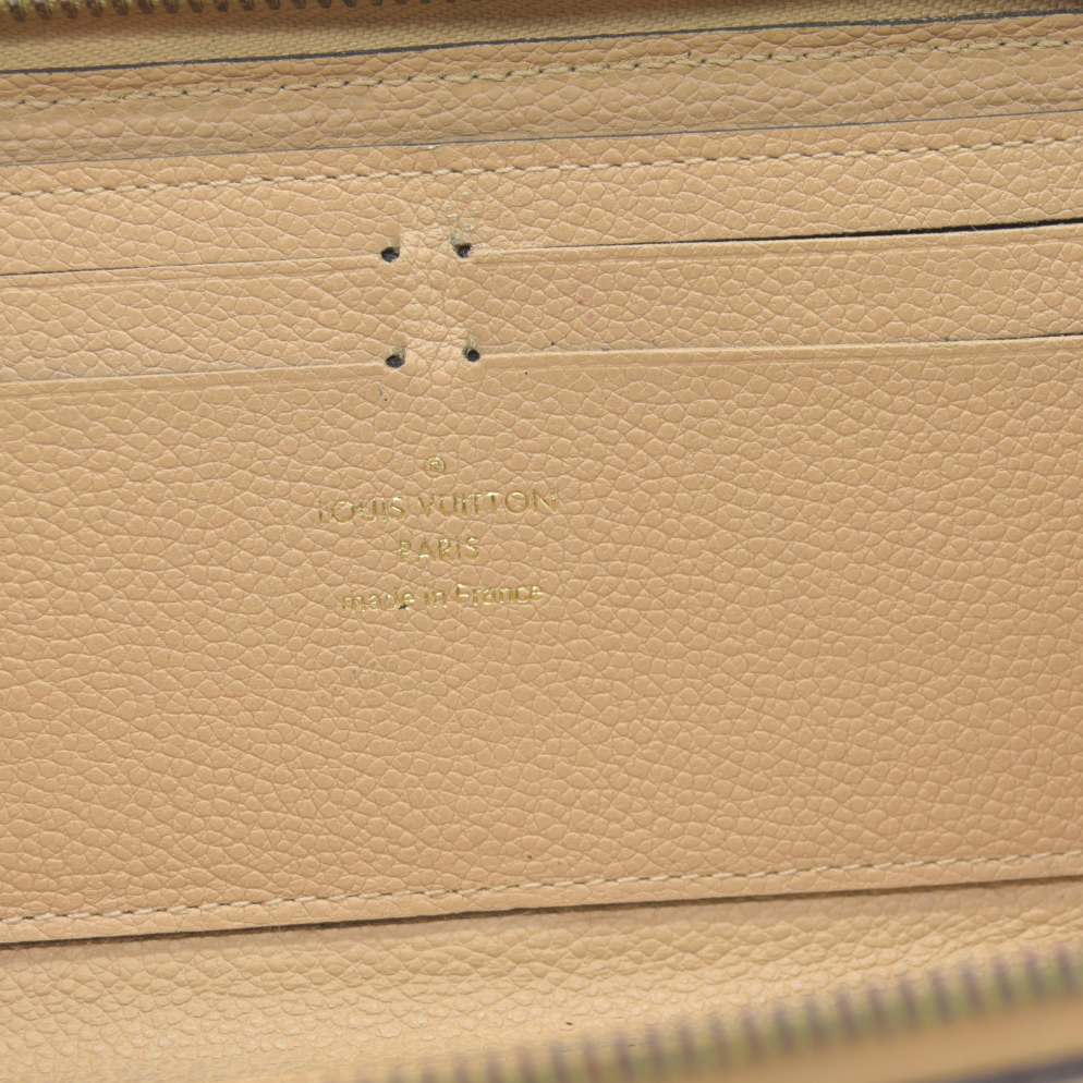 $840 2015 LOUIS VUITTON Monogram Empreinte Clemence Zippy Wallet SP0175