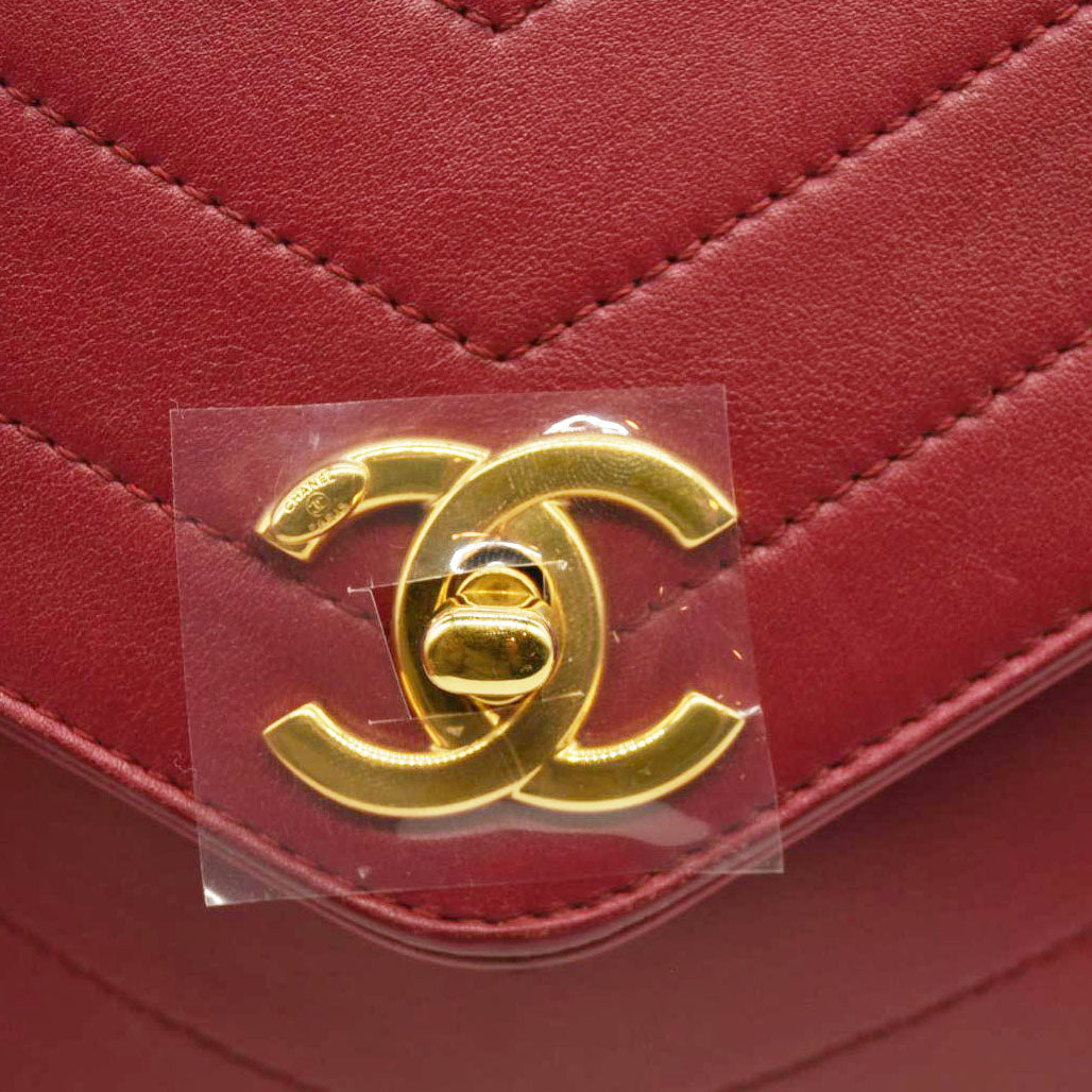 CHANEL  Calfskin Chevron Stitched Small Coco Flap Bag Red