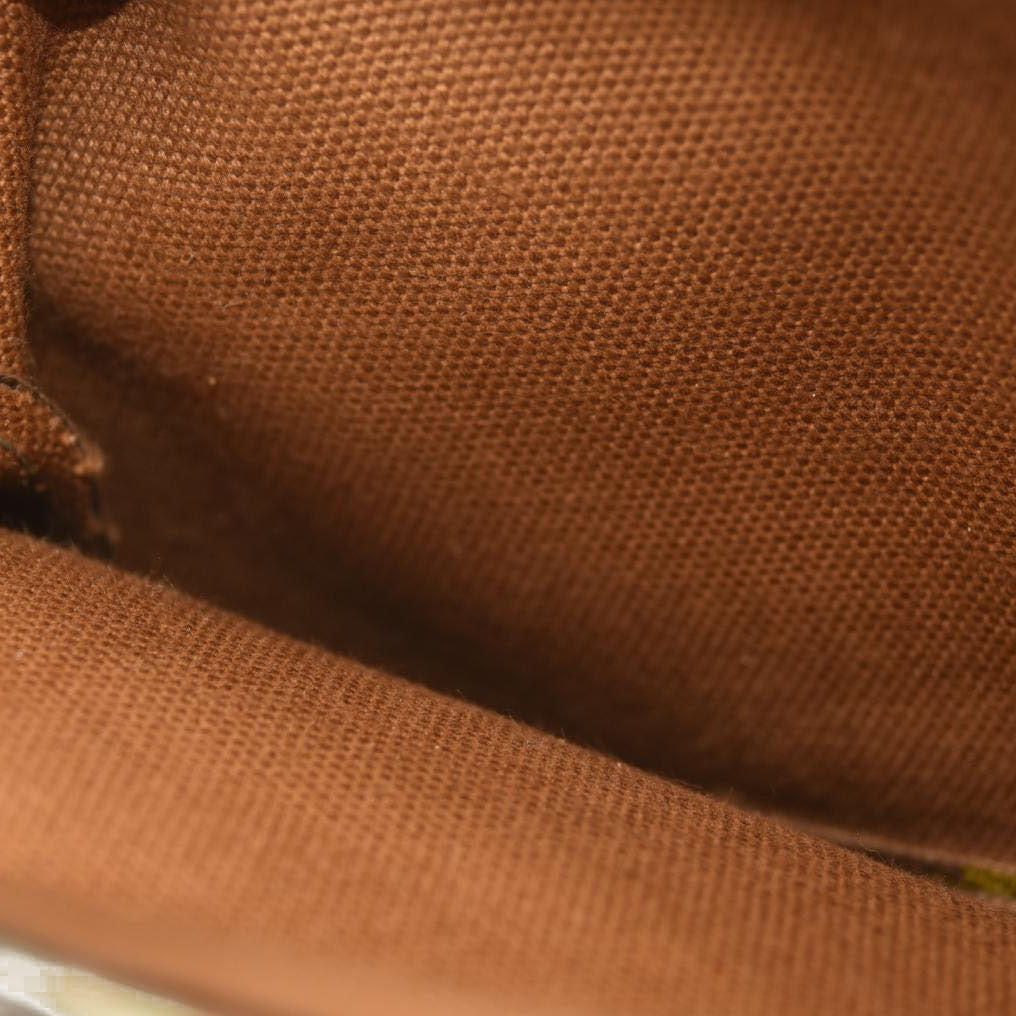 Louis Vuitton  Monogram Kisslock Coin Purse