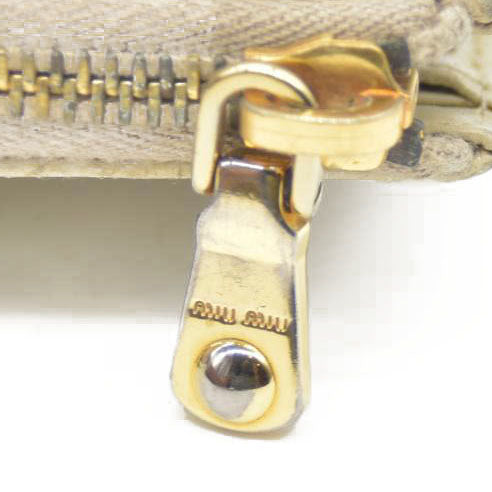 MIU MIU Logo Embossed Leather Zippy Long Wallet White