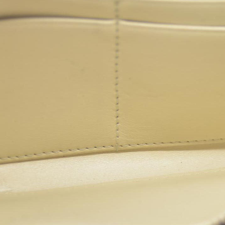 MIU MIU Logo Embossed Leather Zippy Long Wallet White