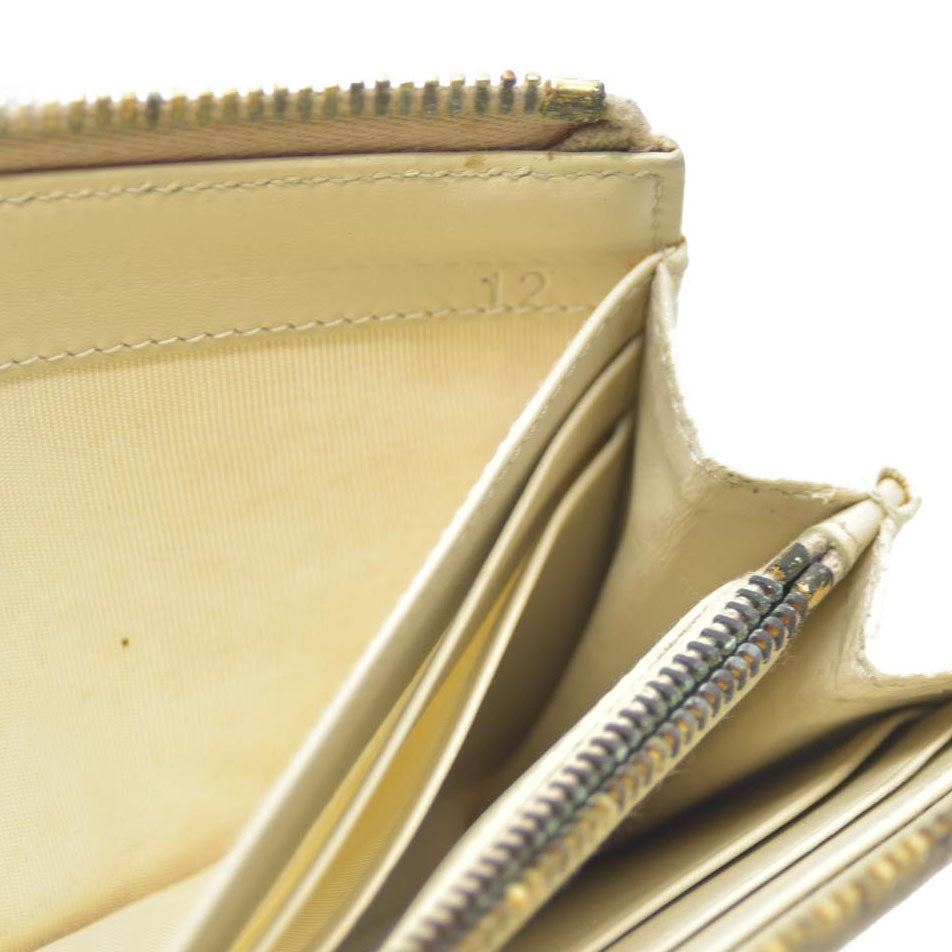 MIU MIU Logo Embossed Leather Zippy Long Wallet White