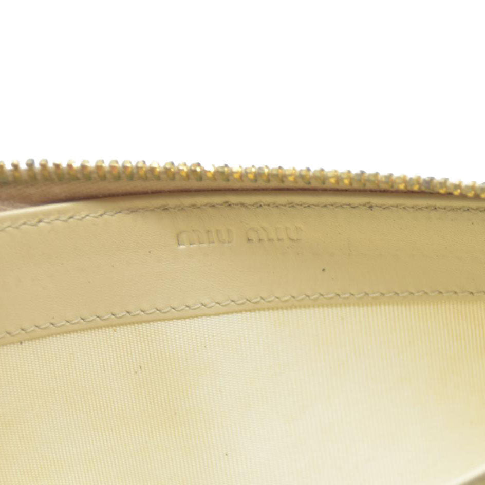 MIU MIU Logo Embossed Leather Zippy Long Wallet White