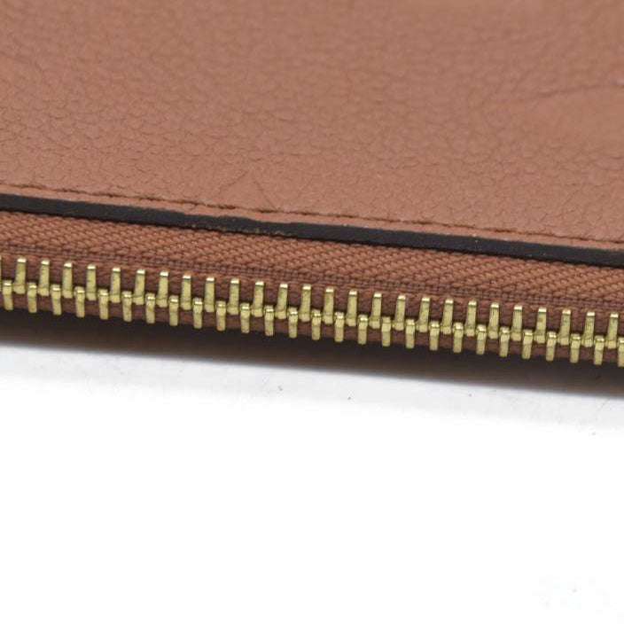 $2940 Louis Vuitton  Empreinte Monogram Giant Neverfull MM Pochette Cognac