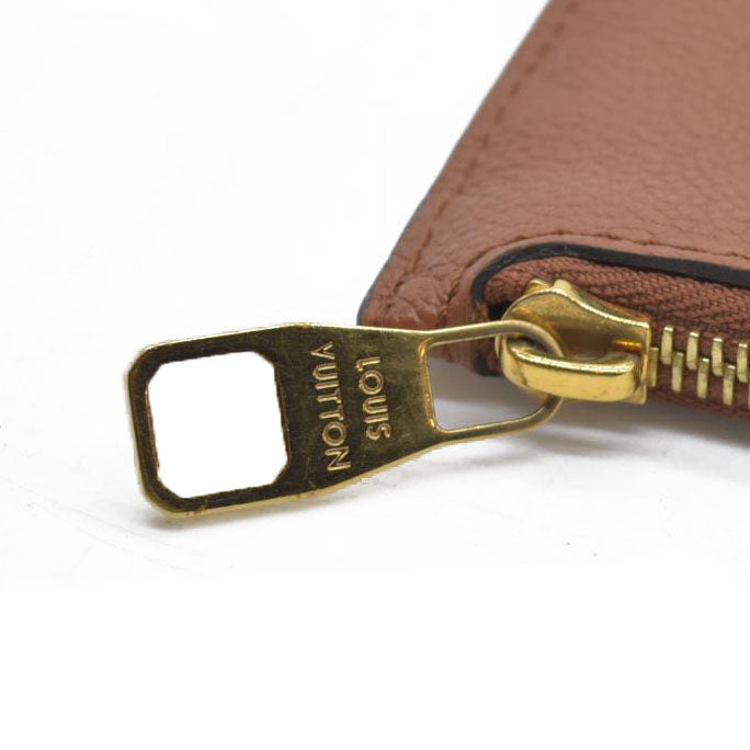 $2940 Louis Vuitton  Empreinte Monogram Giant Neverfull MM Pochette Cognac