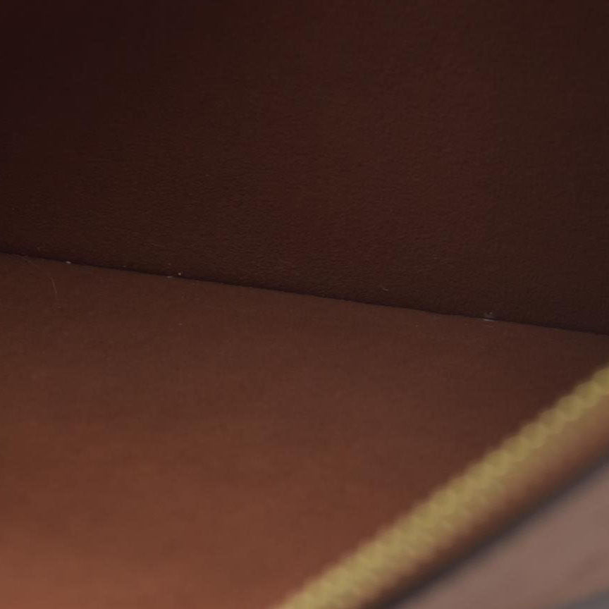 $2940 Louis Vuitton  Empreinte Monogram Giant Neverfull MM Pochette Cognac