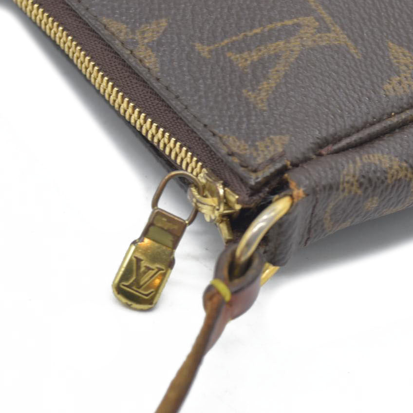 $1290 Louis Vuitton  Monogram Pochette Accessories