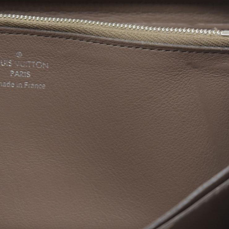 AUCTION $1130 Louis Vuitton Comet Taurillon Leather Zip Zippy Long Wallet Pink