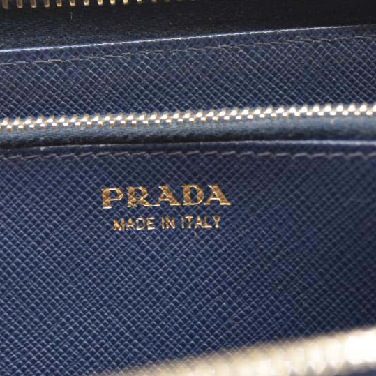 PRADA Saffiano Metal Continental Zippy Zip Around Wallet Blue