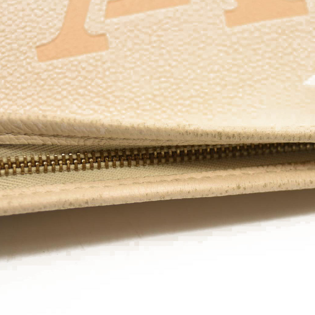 Louis Vuitton  Empreinte Monogram Giant By The Pool Toiletry Pouch 26 Cream Saffron