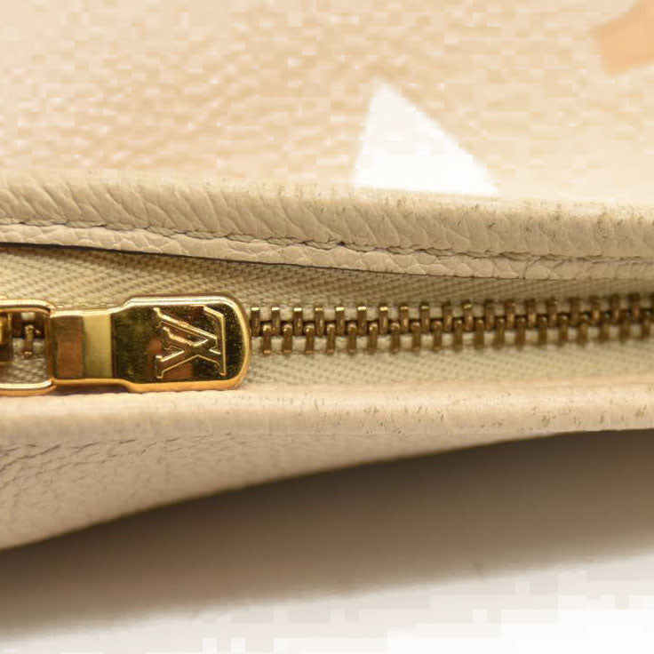 Louis Vuitton  Empreinte Monogram Giant By The Pool Toiletry Pouch 26 Cream Saffron