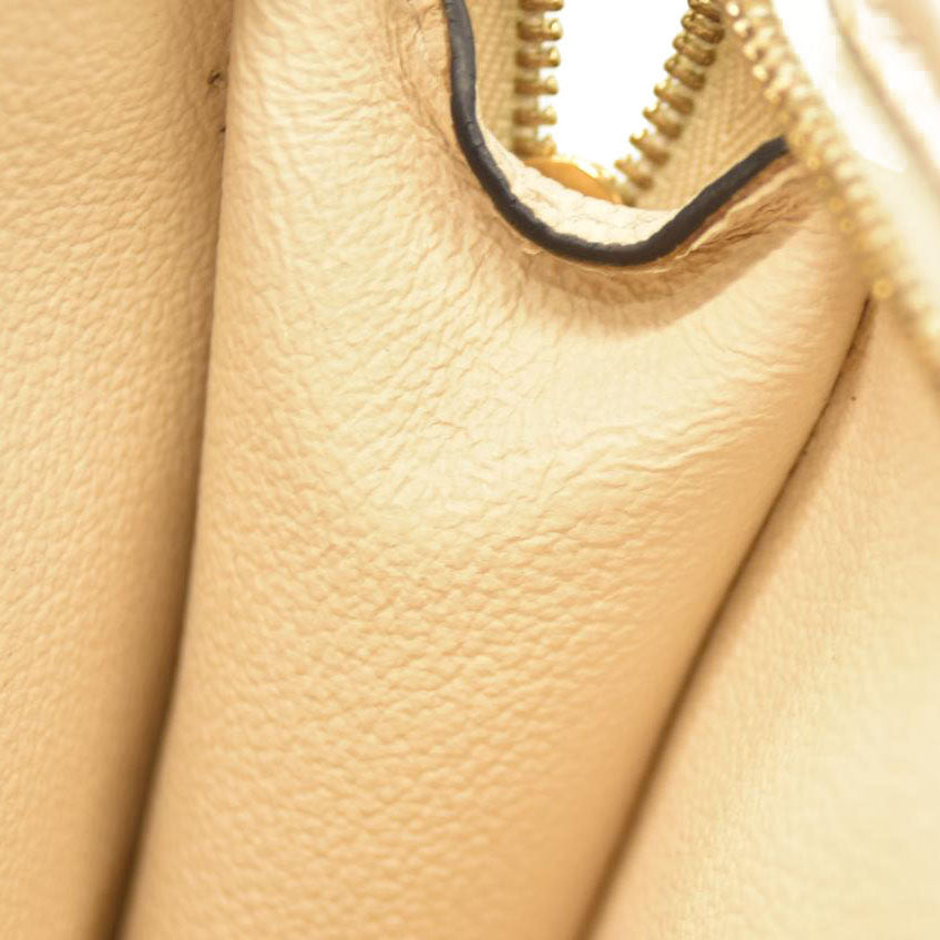 Louis Vuitton  Empreinte Monogram Giant By The Pool Toiletry Pouch 26 Cream Saffron