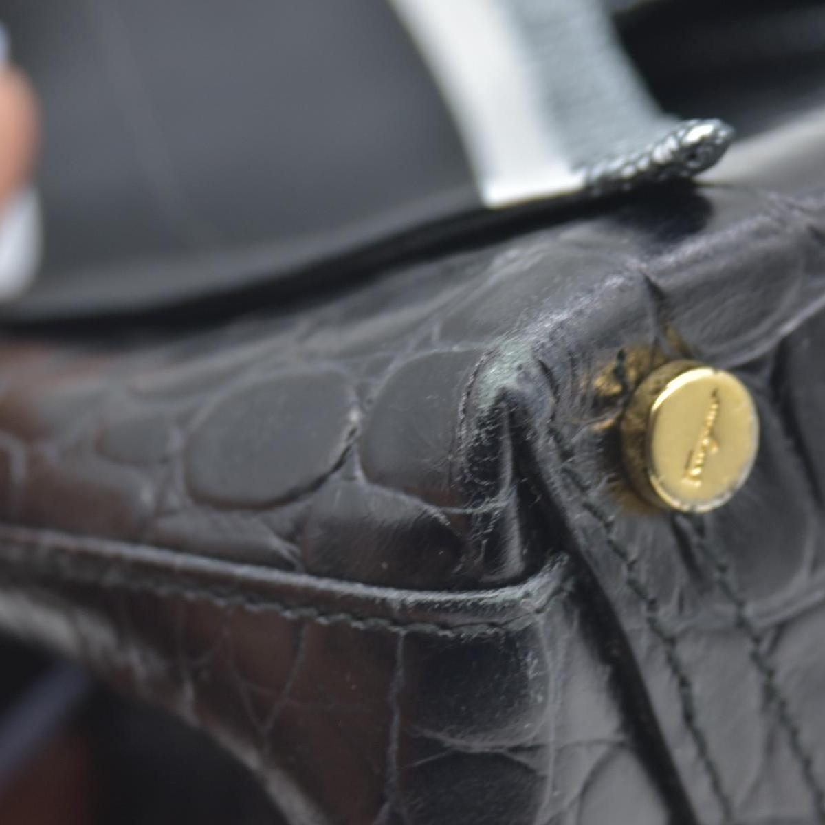 $1200 Salvatore Ferragamo Vara Embossed Leather Shoulder Bag in Black CONSIGNMENT