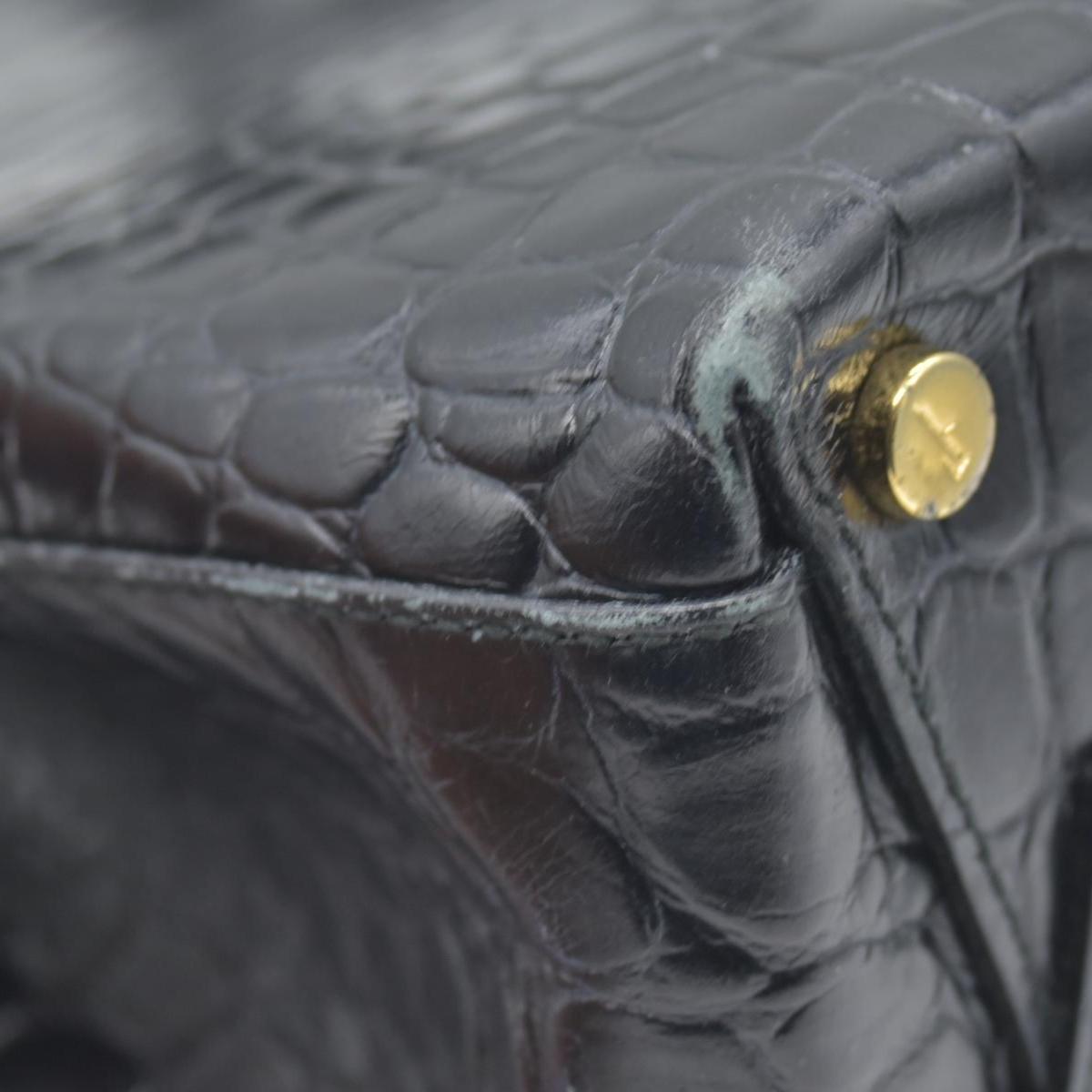 $1200 Salvatore Ferragamo Vara Embossed Leather Shoulder Bag in Black CONSIGNMENT
