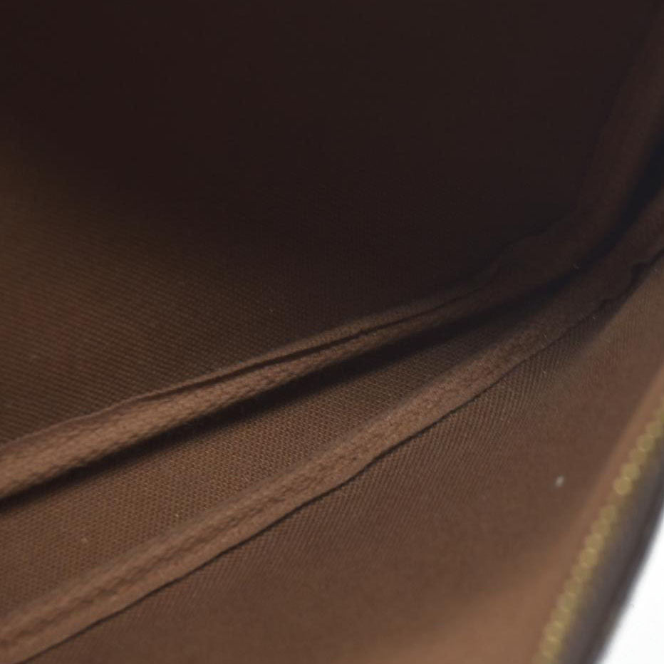 $1660 Louis Vuitton Monogram Pochette Accessories VI0090