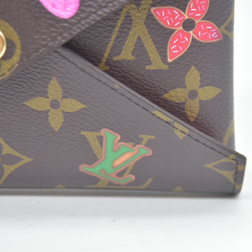 AUCTION $1080 Louis Vuitton Medium Monogram Candy Factory Kirigami Pochette