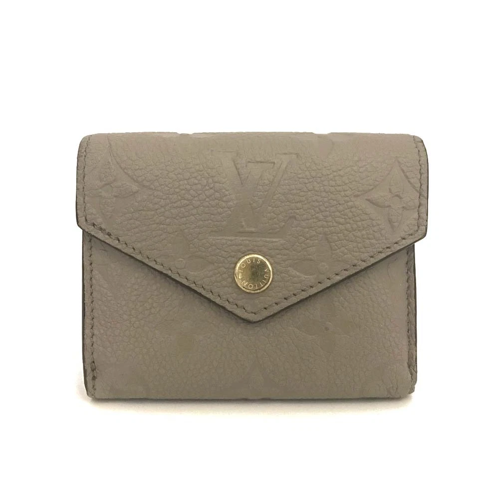 $795 Louis Vuitton Monogram Empreinte Portefeuille Zoe Mini Wallet