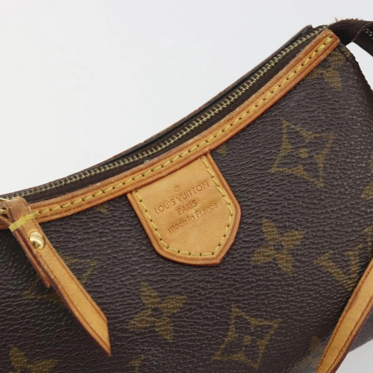 $1250 Louis Vuitton Monogram Mini Pochette Delightful