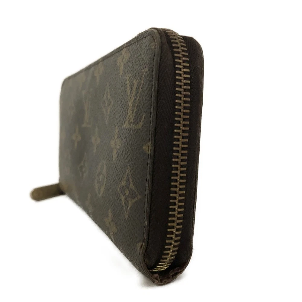 $960 2009 Louis Vuitton Monogram Zippy Wallet  CA3039