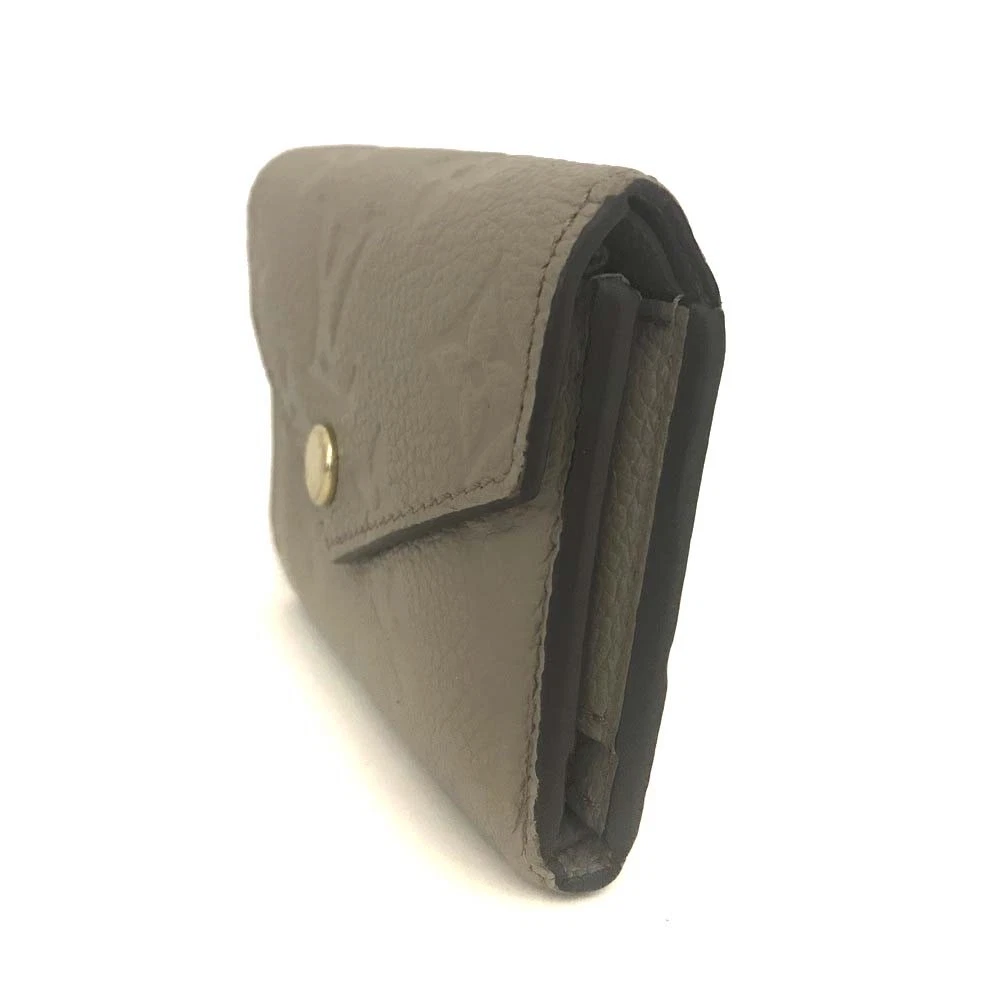 $795 Louis Vuitton Monogram Empreinte Portefeuille Zoe Mini Wallet