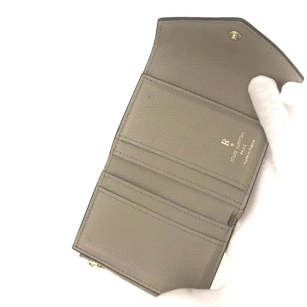 $795 Louis Vuitton Monogram Empreinte Portefeuille Zoe Mini Wallet