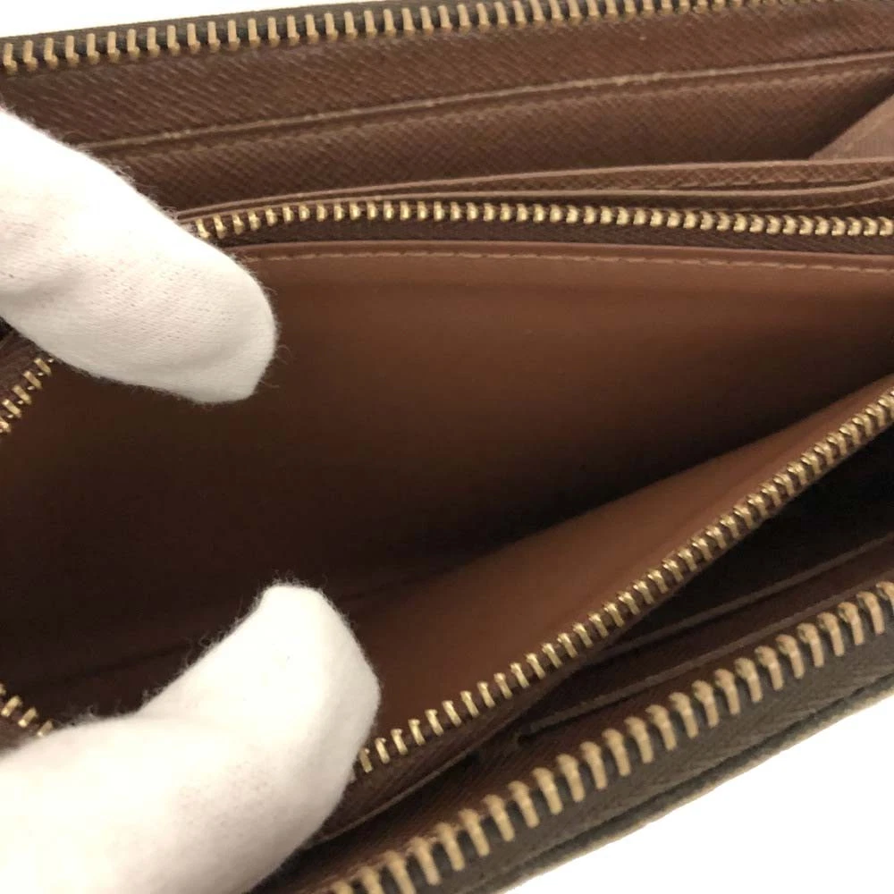 $915 2009 Louis Vuitton Monogram Zippy Zip Around Long Wallet Brown CA0029