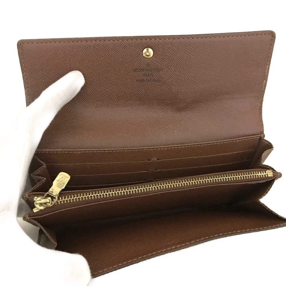 $775 2006 Louis Vuitton Monogram Sarah Wallet MI1026