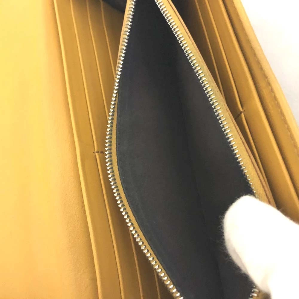 FENDI Zucca Leather Long Bifold Wallet Yellow/6CF1174