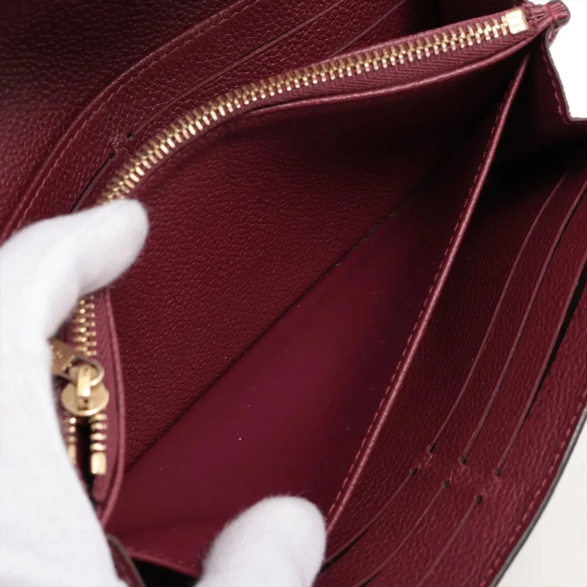 $1030 Louis Vuitton Empreinte Sarah Wallet NM Raisin Long Wallet