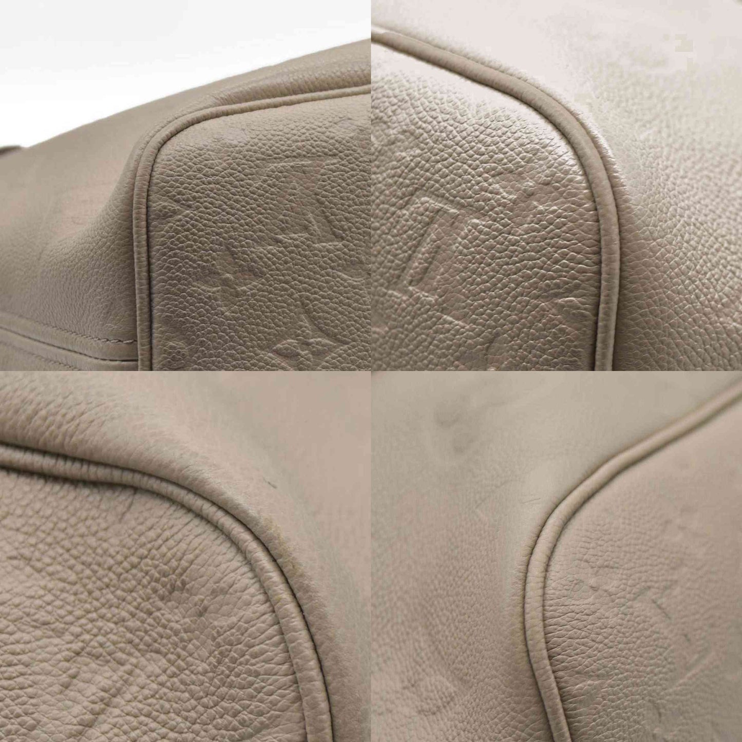 $2940 Louis Vuitton Empreinte Leather Neverfull MM