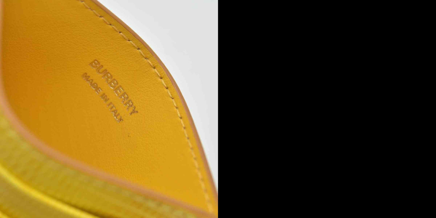 $355 Burberry embossed leather tb card case Yellow CONSIGNMENT