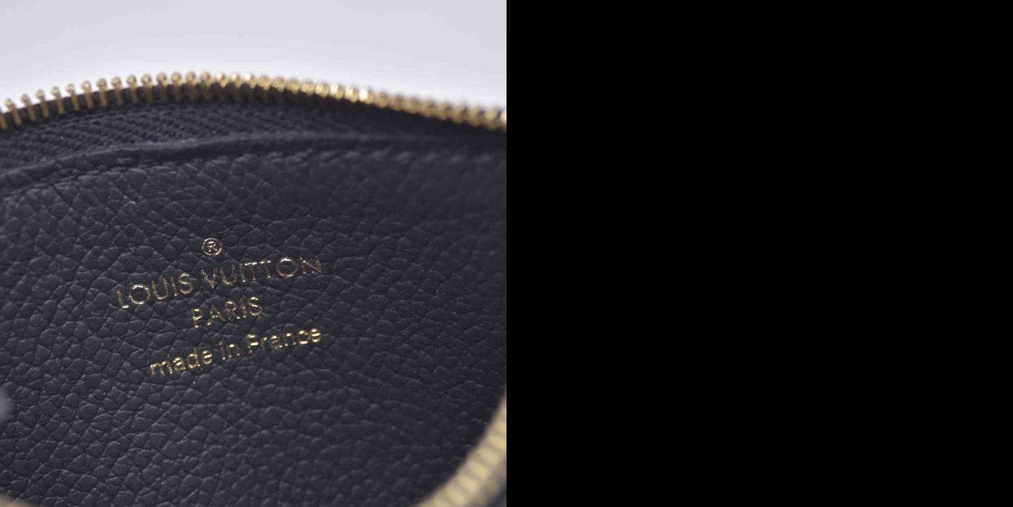 $590 RFID Louis Vuitton Monogram Empreinte Romy Leather Card Holder