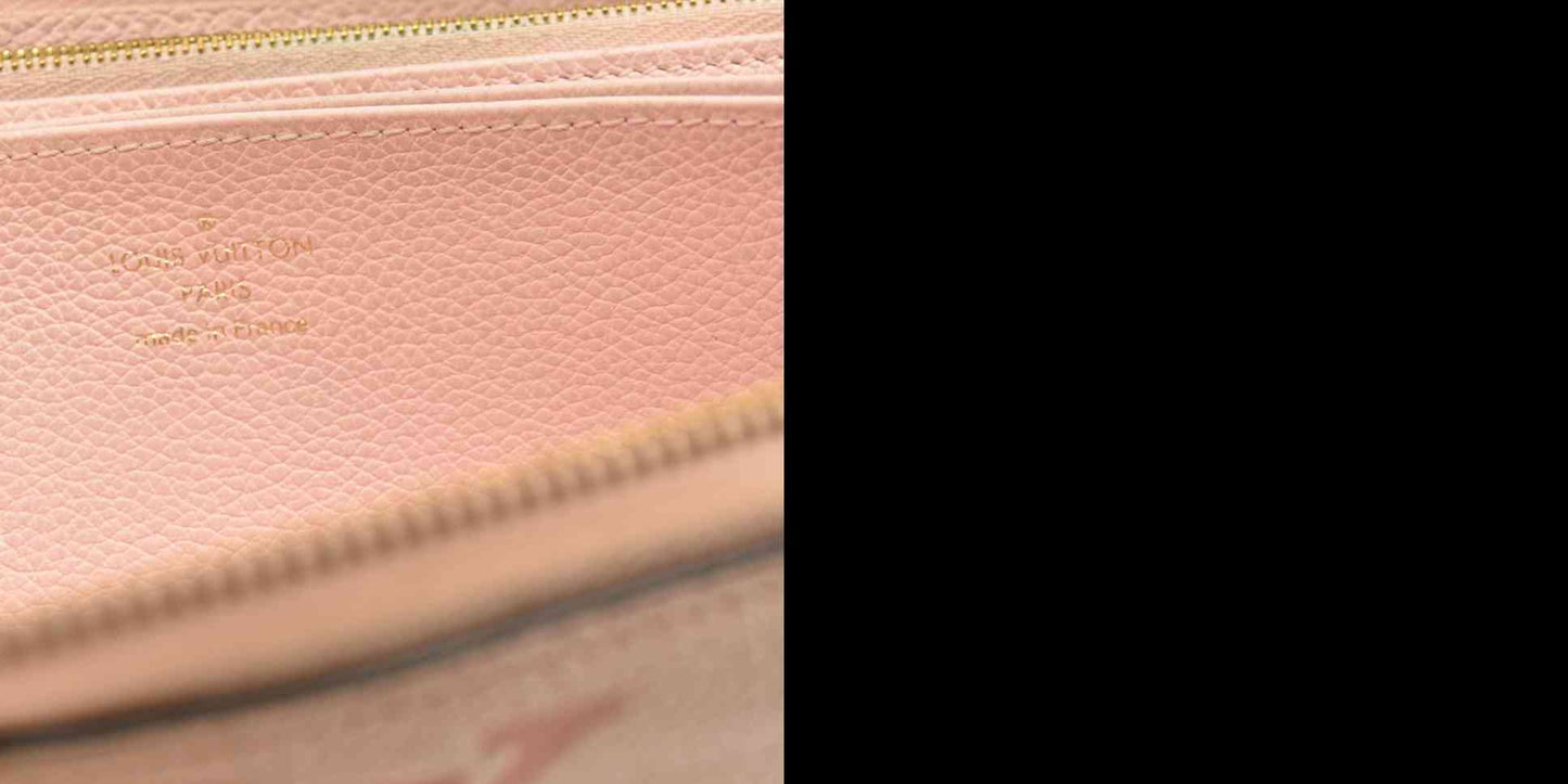 LOUIS VUITTON Empreinte Monogram Giant By The Pool Zippy Wallet Bouton De Rose