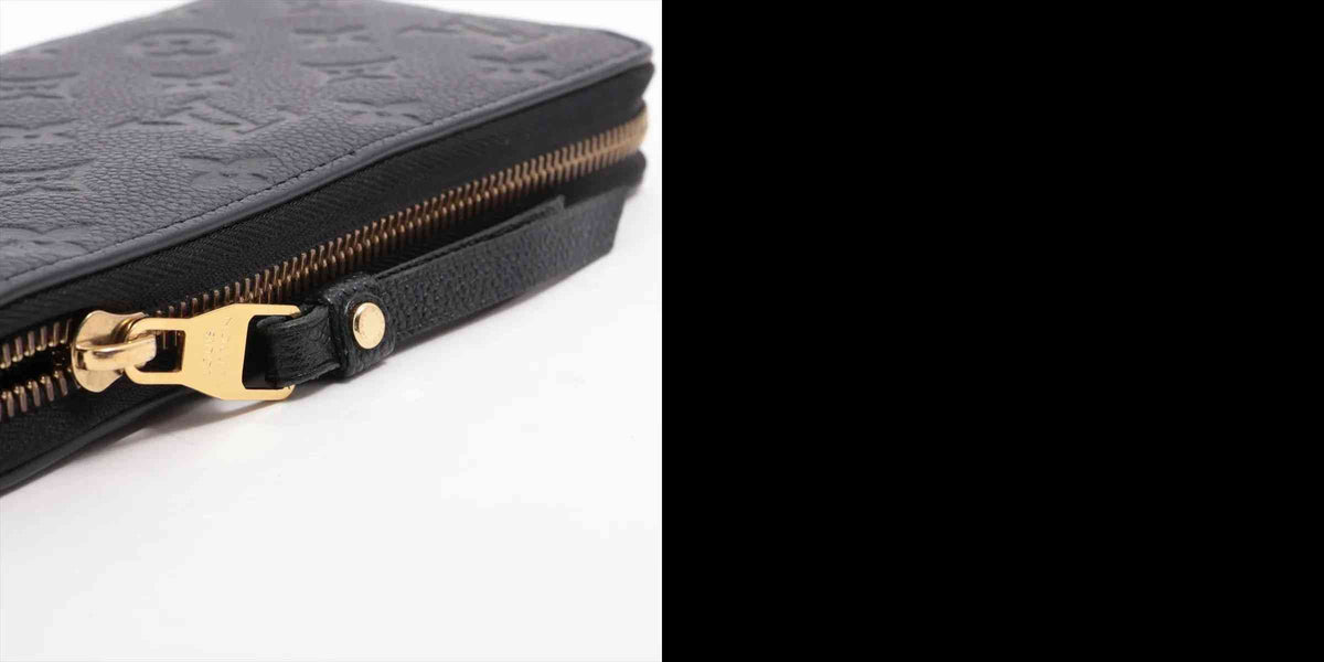 $1170 Louis Vuitton Empreinte Zippy Wallet Black